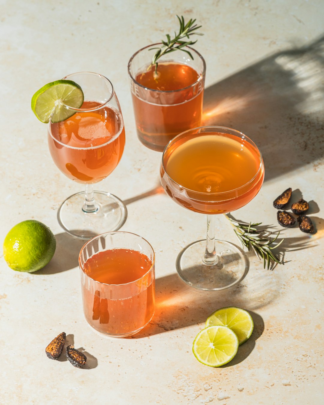 three-clear-drinking-glasses-with-orange-liquid-gcwktmnxvuu